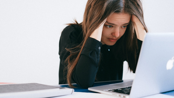 stressed woman working laptop