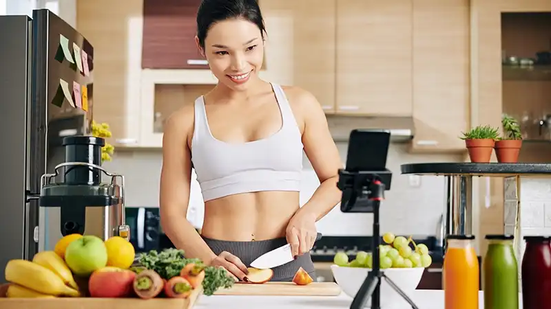 woman recording cooking video