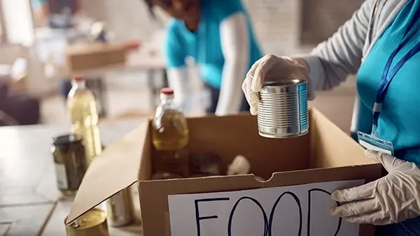 nonprofit search marketing volunteer packing food donation boxes